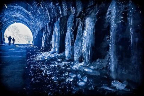 Surreal image of ice inside an old railway tunnel Stock Photos