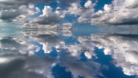 Surreal mirrored timelapse of dramatic clouds forming an endless symmetrical... Stock Footage 341774287