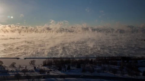 Surreal Mist Over FROZEN Lake Time Lapse Stock Footage