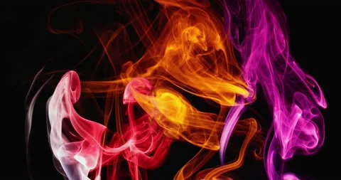 Surreal slow dance of clouds of colored smoke. Slow motion. Stock Footage 145633112