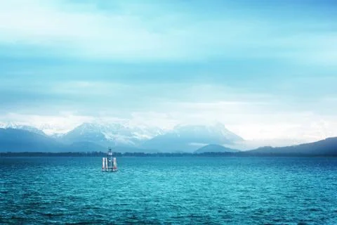 Surreal view of Bodensee with the Alps in the background Stock Photos
