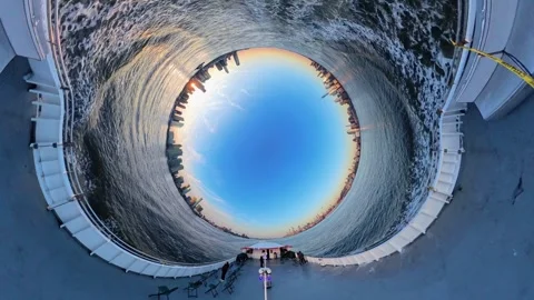 Surreal Vortex effect of ferry on frozen Hudson River, NYC, USA 動画素材 306035413