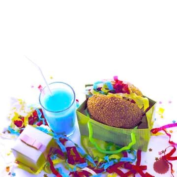 Surrealism Festive composition drinks snacks holiday hamburger cookie tinsel  Stock Photos