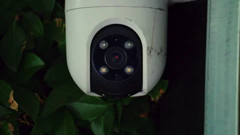 Surveillance camera with active night vision illuminating an area, providing Stock Footage 339813628