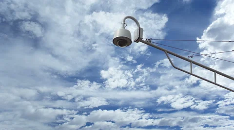 Surveillance Camera Against Timelapse Clouds Stock Footage 59585097