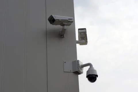 Surveillance camera and dome camera on the office building Stock Photos