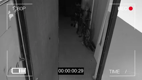Surveillance camera caught the robber in a mask with a crowbar Stock Footage 75314219