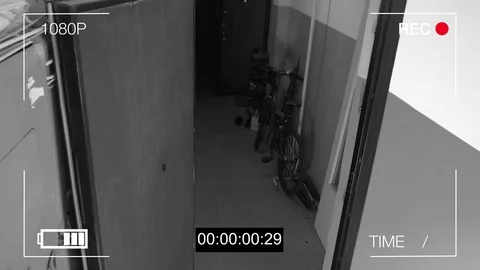 Surveillance camera caught the robber in a mask running off with a bag of loot Stock Footage 75314244