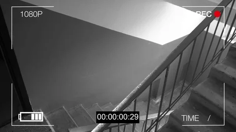 Surveillance camera caught the robber in a mask running off with a bag of loot Stock Footage 75314391