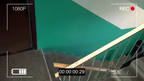 Surveillance camera caught the robber in a mask with a crowbar Stock Footage 77229356