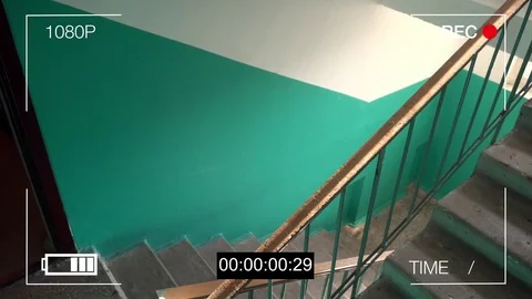 Surveillance camera caught the robber in a mask running off with a bag of loot Stock Footage 77229479