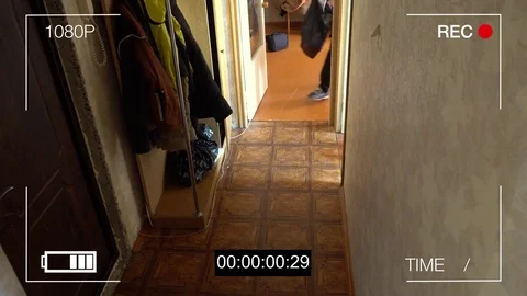 Surveillance camera caught the robber in a mask running off with a bag of loot 스톡 동영상 77229734