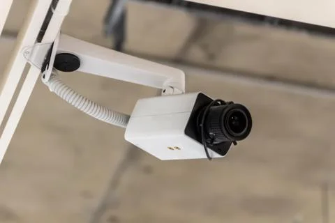 Surveillance camera on the ceiling Stock Photos