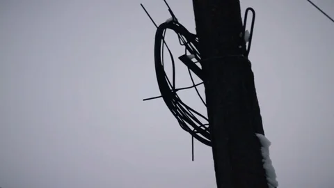 Surveillance camera on a lamp post on blue sky background Video stock 72249181