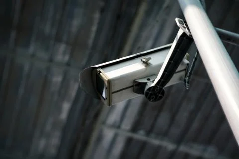 Surveillance camera or CCTV security camera in factory Stock Photos