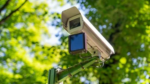 Surveillance Camera In Park, Security System With Surveillance Cameras, green ve Stock Photos