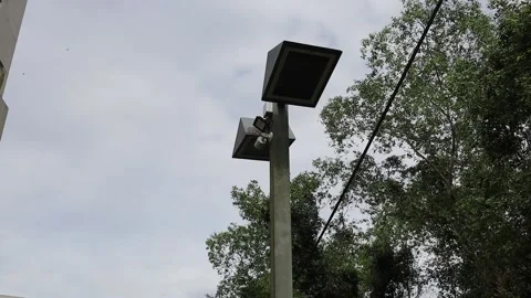 Surveillance camera on a pole Stock Footage 170168432