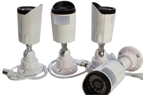 Surveillance camera on a white background. Stock Photos