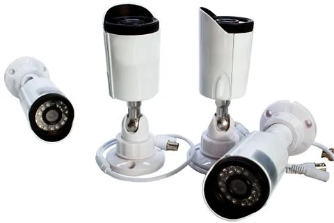 Surveillance camera on a white background. Stock Photos