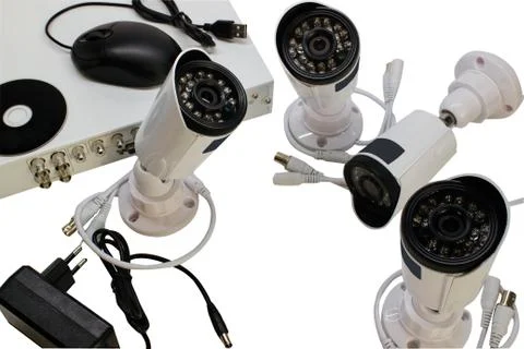 Surveillance camera on a white background. Stock Photos