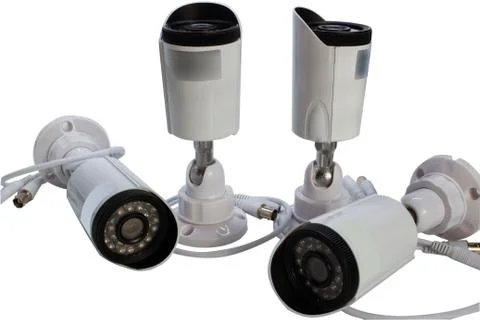 Surveillance camera on a white background. Stock Photos