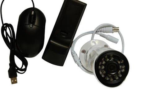 Surveillance camera on a white background. Stock Photos