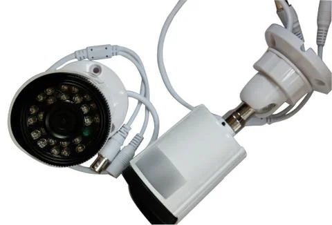 Surveillance camera on a white background. Stock Photos
