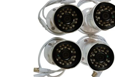 Surveillance camera on a white background. Stock Photos