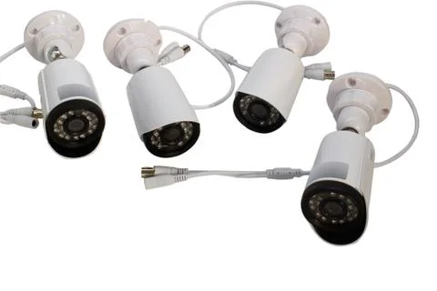 Surveillance camera on a white background. Stock Photos