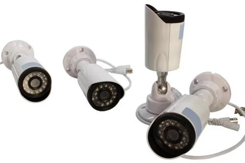 Surveillance camera on a white background. Stock Photos