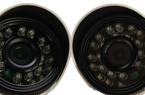 Surveillance camera on a white background. Stock Photos