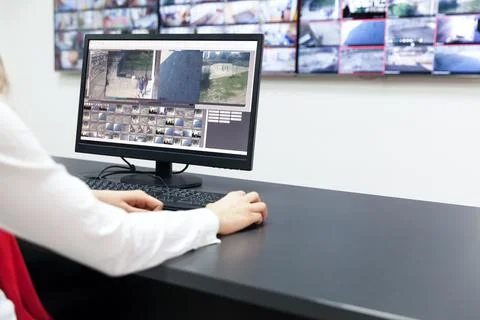 Surveillance control room operator at work Foto stock