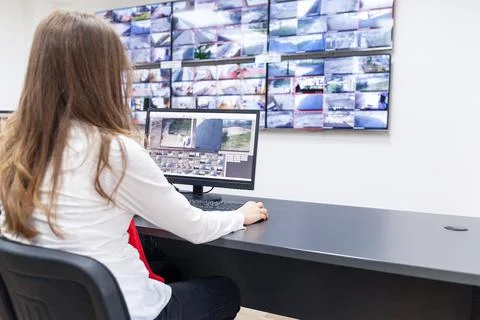 Surveillance control room operator at work Stock Photos