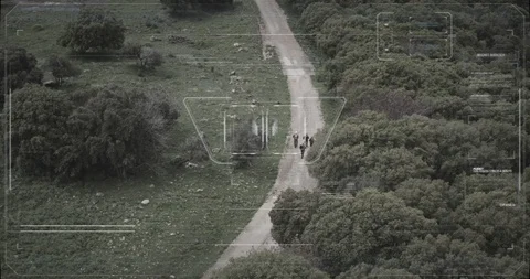 Surveillance drone camera view of terrorist squad walking with weapons Vidéo 106680940