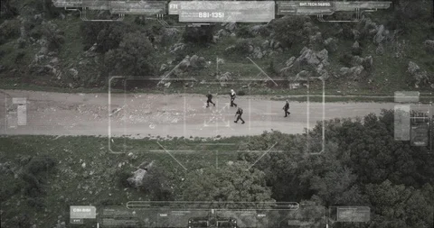 Surveillance drone camera view of terrorist squad walking with weapons Video stock 106681079