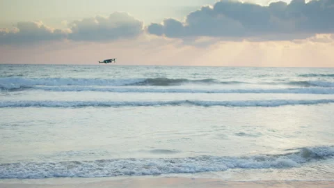 Surveillance drone flight over the surface of the sea, sunset on the sea Stock Footage 307940298