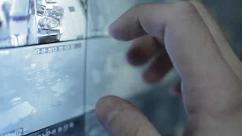 Surveillance guard analyzing cctv spy. close-up cctv security monitor. 動画素材 227120719