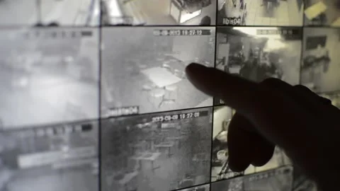 Surveillance security technology cctv on the phone monitor. split screen display Stock Footage 169643579