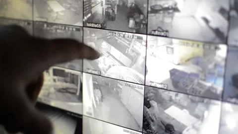 Surveillance security technology cctv on the phone monitor. split screen display Stock Footage 169702696