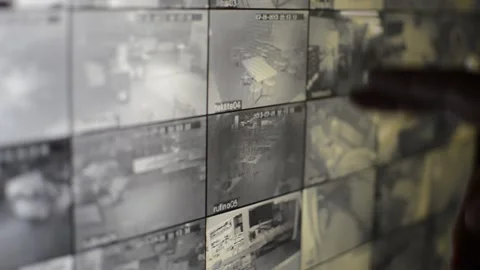 Surveillance security technology cctv on the phone monitor. split screen display Stock Footage 169702781