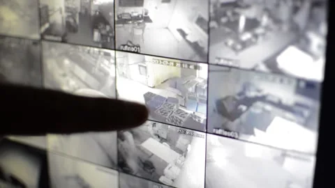 Surveillance security technology cctv on the phone monitor. split screen display Stock Footage 169702812
