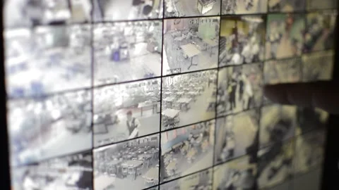 Surveillance security technology cctv on the phone monitor. split screen display Stock Footage 169703368