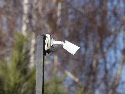 The surveillance system is located on a pole in the open. Threat to confident Stock Photos