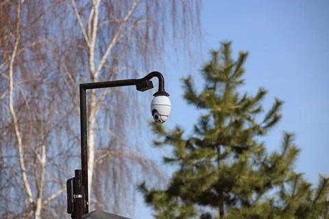 The surveillance system is located on a pole in the open. Threat to confide.. Stock Photos