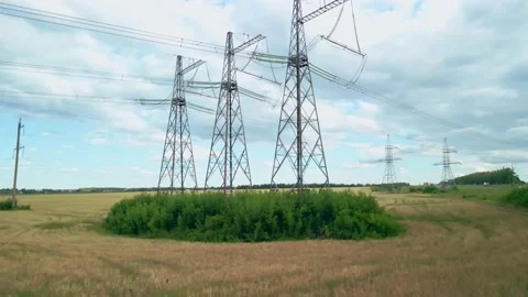 Survey of high-voltage power lines by a quadrocopter. High Voltage Electricity Stock Footage 158183029