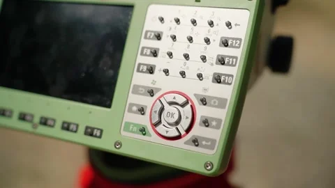 Surveying instrument control panel with keypad and navigation buttons Video stock 348029588