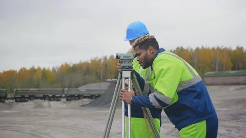 Surveyor engineer making measures with tablet pc to record data. Stock Footage 124306771