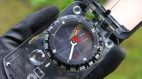 Survival compass for navigation and finding directions in Nature Stock Footage 111856297