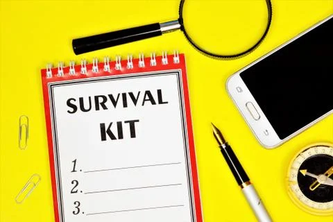 Survival kit-a text message in the form on the planning folder. Stock Photos