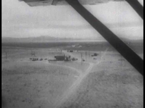 Survival Town atomic test shows destruction to homes and infrastructure from an Stock Footage 75098138